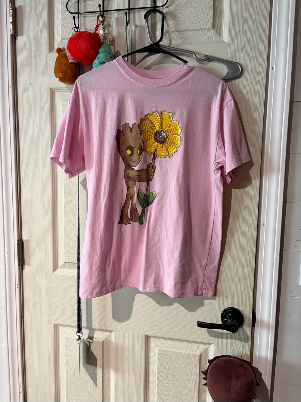 Pink Graphic T-Shirt with Flower Design